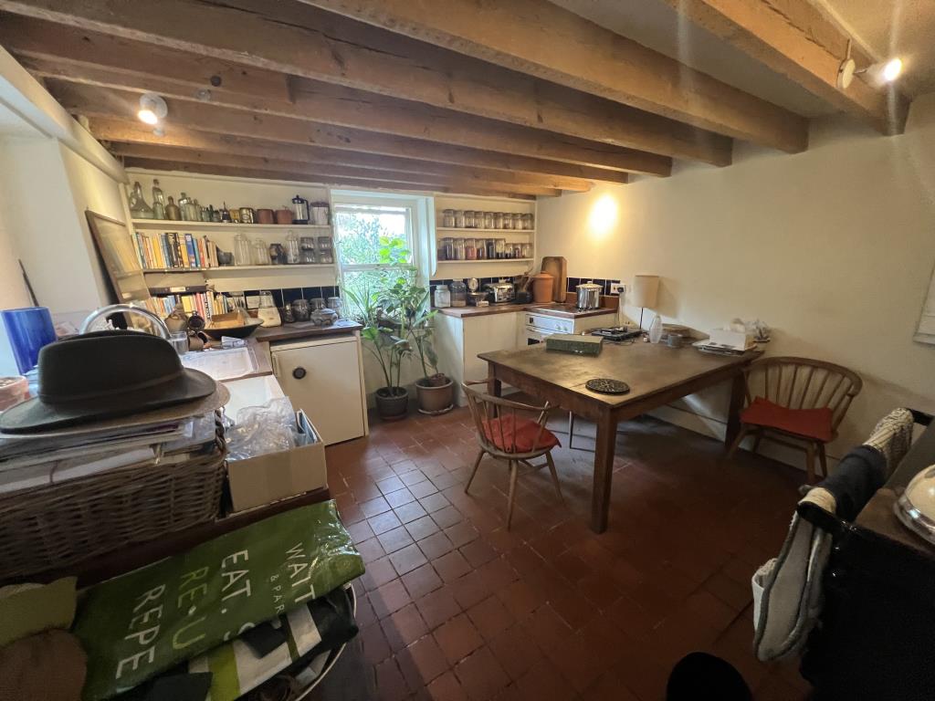 Lot: 16 - DETACHED THREE-BEDROOM COTTAGE FOR IMPROVEMENT WITH PLANNING FOR EXTENSION - General view of the kitchen